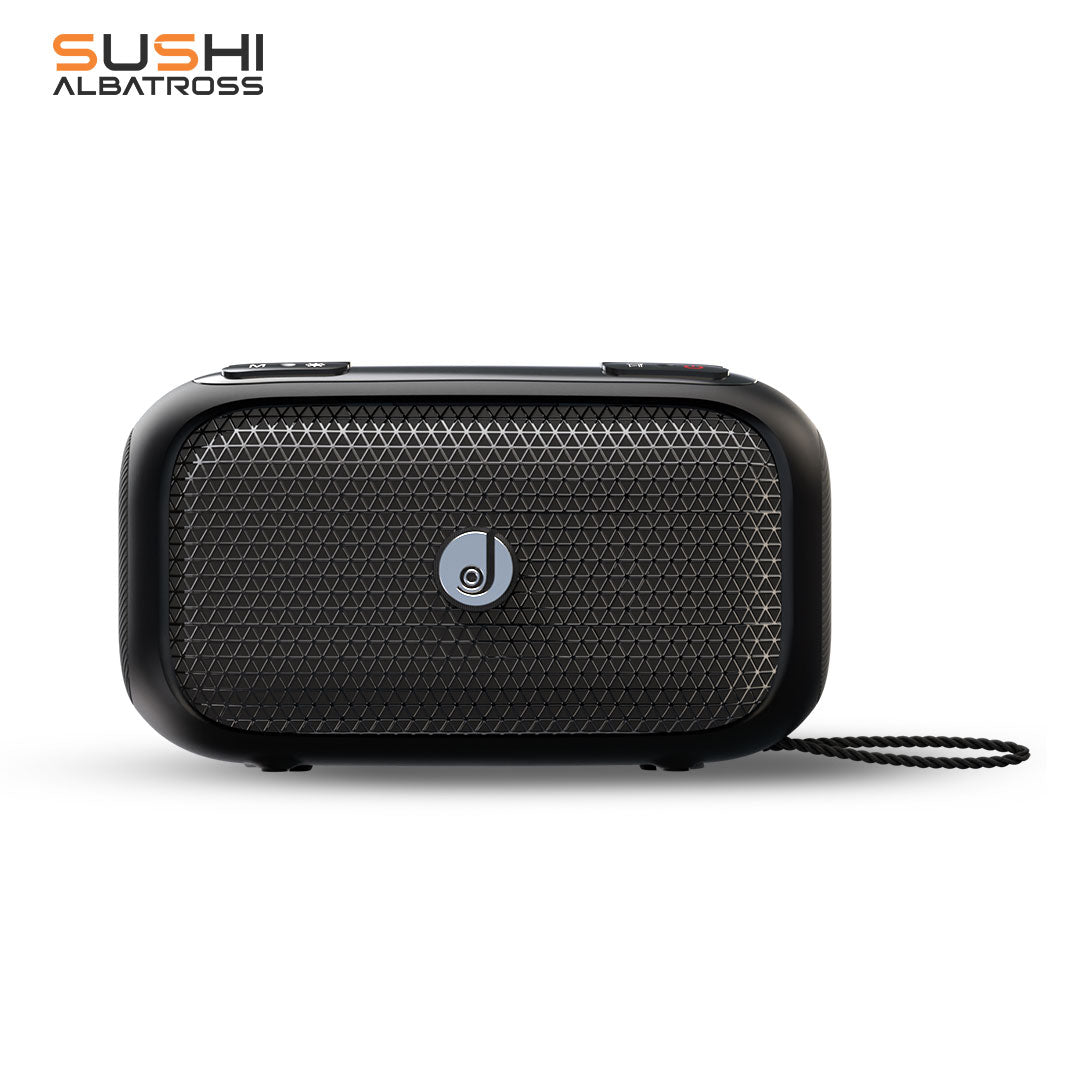 A black portable Bluetooth speaker with a textured surface and a logo in the center, equipped with a strap for portability.